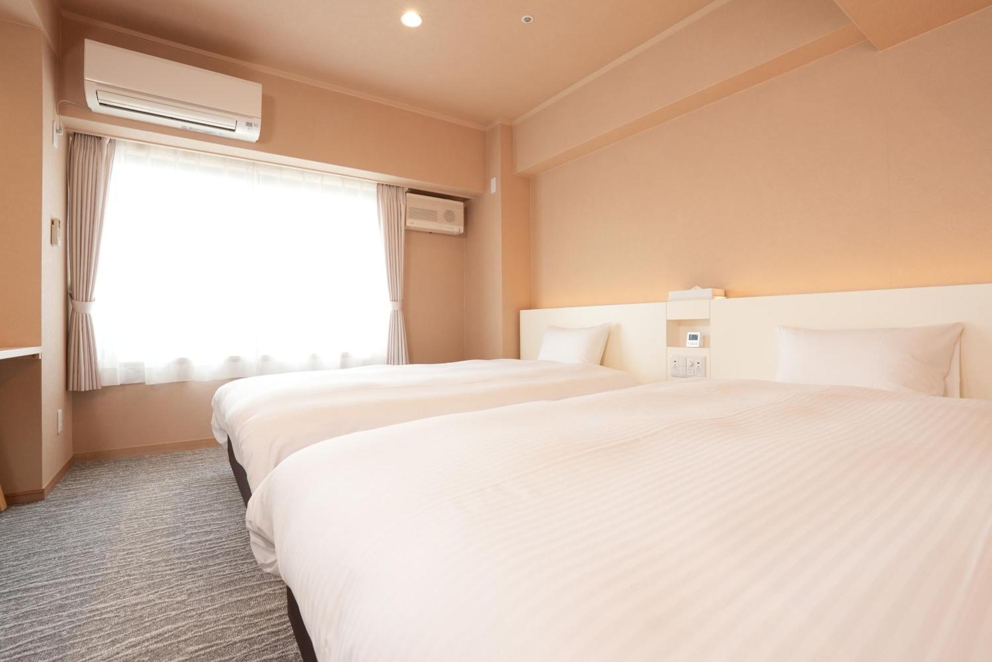 Hotel Alpha Inn Akita Bagian luar foto